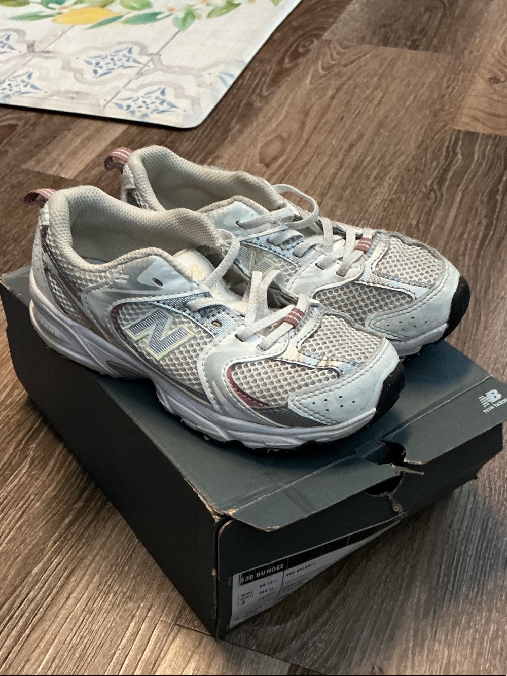 New Balance Kids White and Pink Accent Sneakers